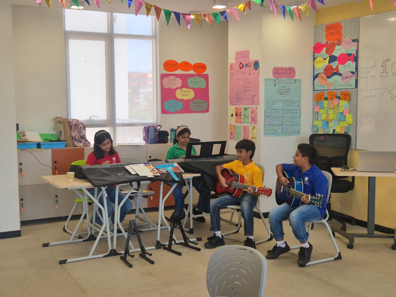 RISE students playing guitar and keyboard during Creator Hour